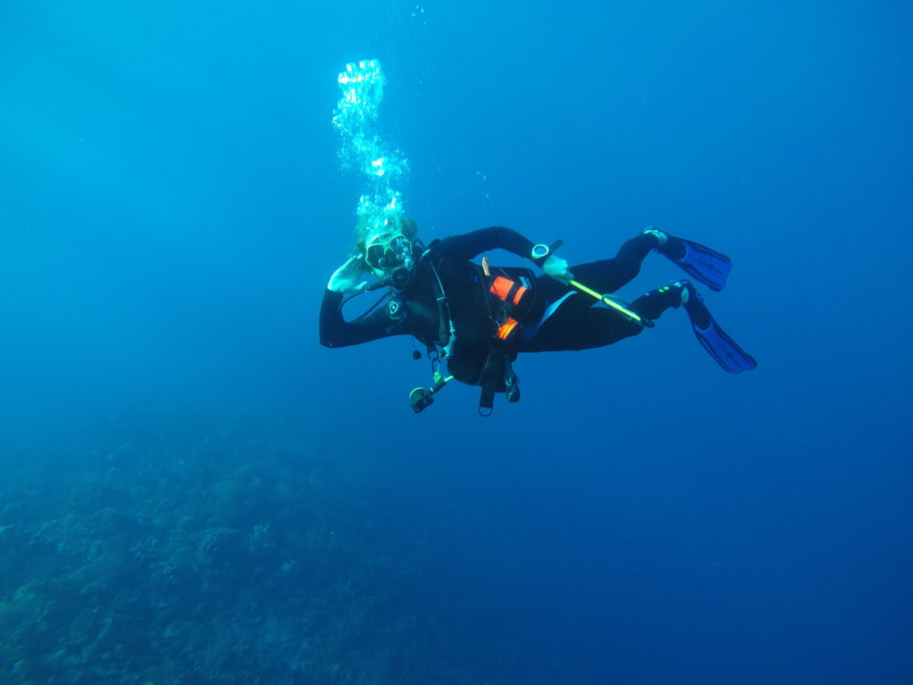 Pulling the ol' "Burt Reynolds" while doing some diving in Honduras.